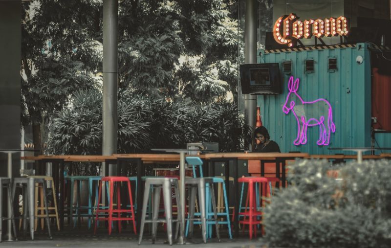 A Restaurant With A Woman With No Customers Due To Lockdown And Coronavirus